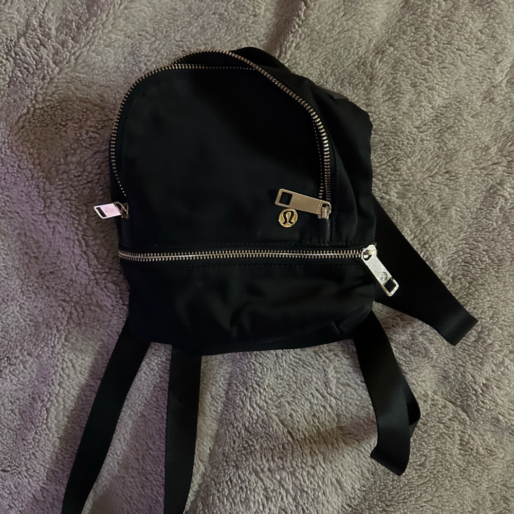 Lululemon Black Mini Backpack with Gold Accents